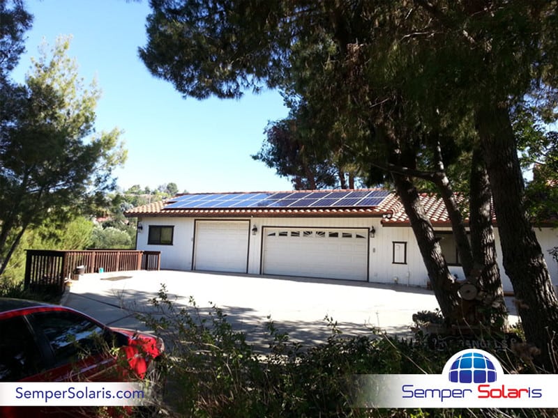 Solar Panels Installed on Roof Above Garage