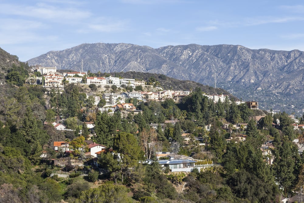Houses on the hills of Glendale with the San Gabriel Mountains in their backyard.