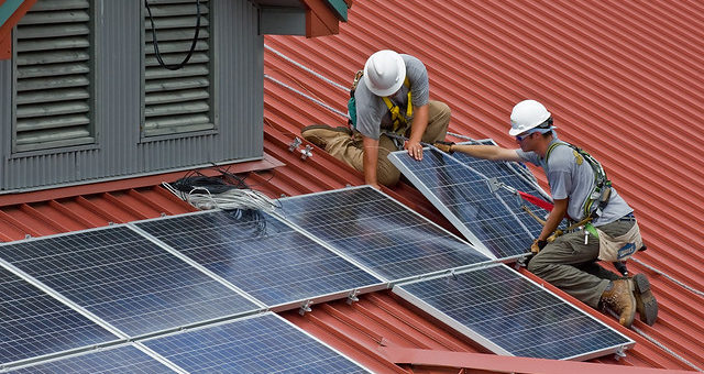 Semper Solaris installers working to get solar panels installed on a home in Vista