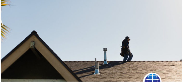 Semper Solaris roofer checking his roofing installation on a home in Long Beach.