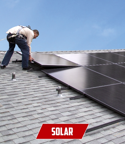 Solar panel installer on roof
