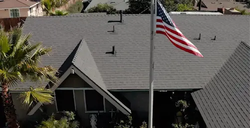 Weather resistant roof installation services, beautiful dark roof with the best warranty