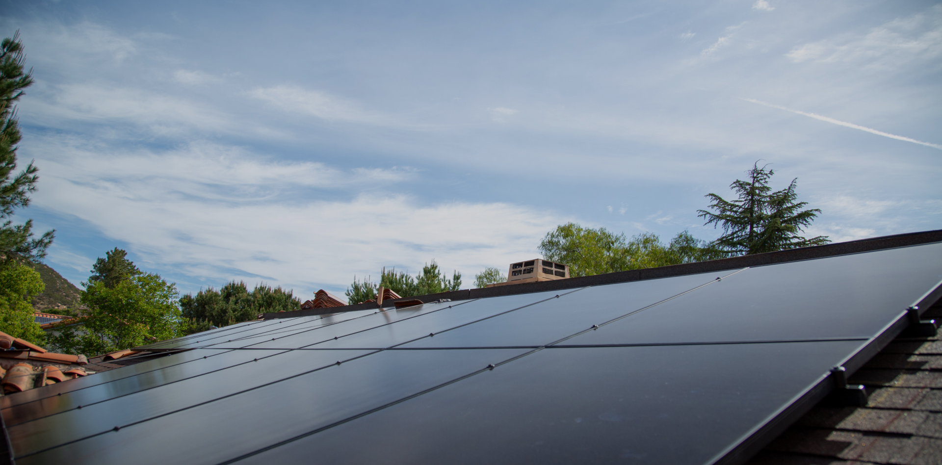 Solar panels generating energy on a cloudy day