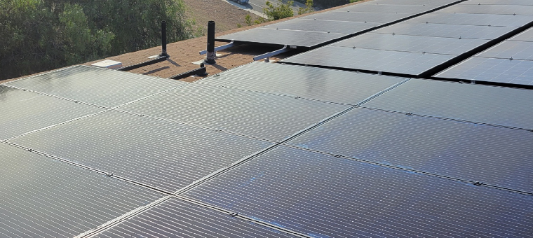 Entire roof of single family home covered with solar panels.